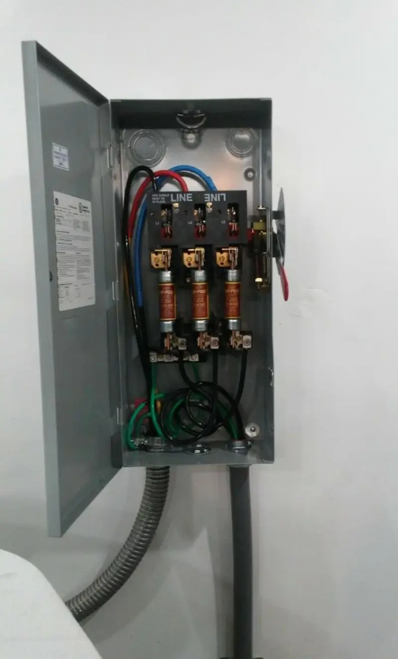 Three-phase disconnect switch installed for Smoke Detector Installation in Dennis